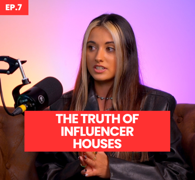 A young woman with long, wavy hair is seated against a softly illuminated background of purple and pink hues. She wears a stylish black leather jacket and a silver necklace, speaking intently into a microphone set on a wooden table. A bold red caption reads, "THE TRUTH OF INFLUENCER HOUSES, EP. 7," contrasting against the vibrant backdrop.