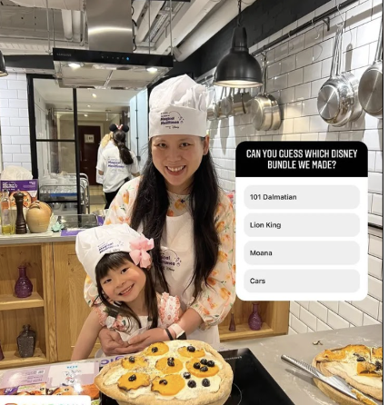 A mother and daughter cooking