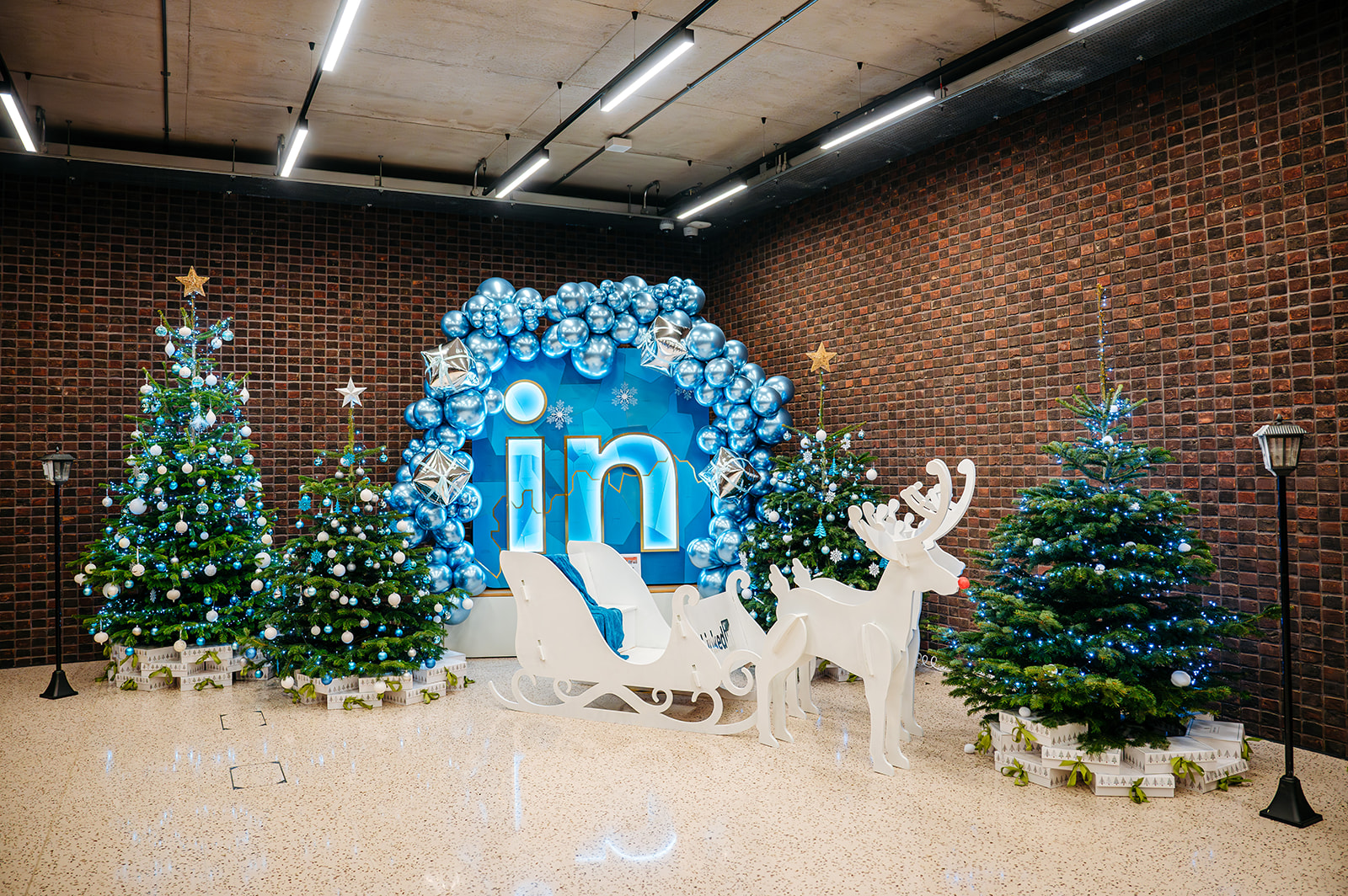 Glass reindeer in front of a big LinkedIn logo