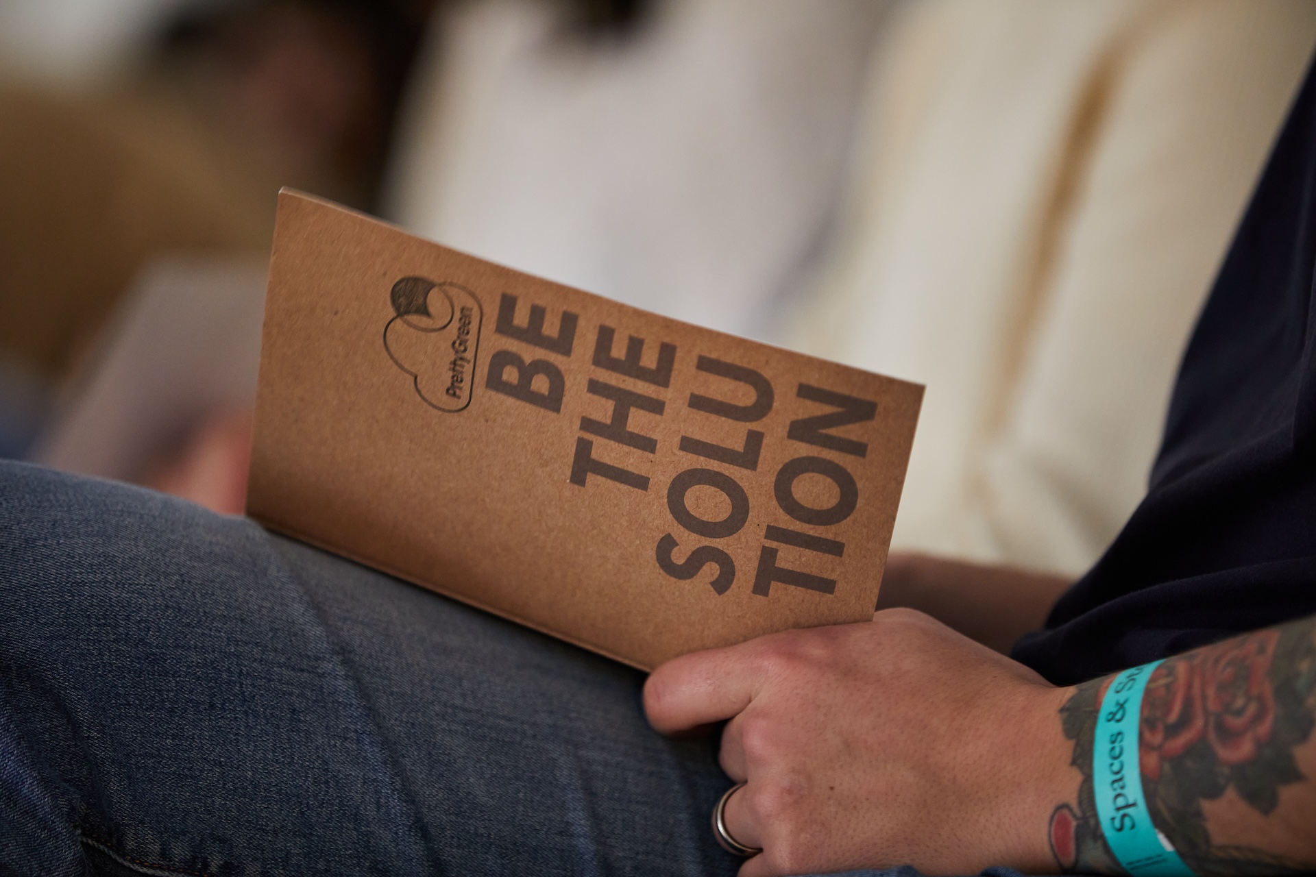 A person holding a notepad