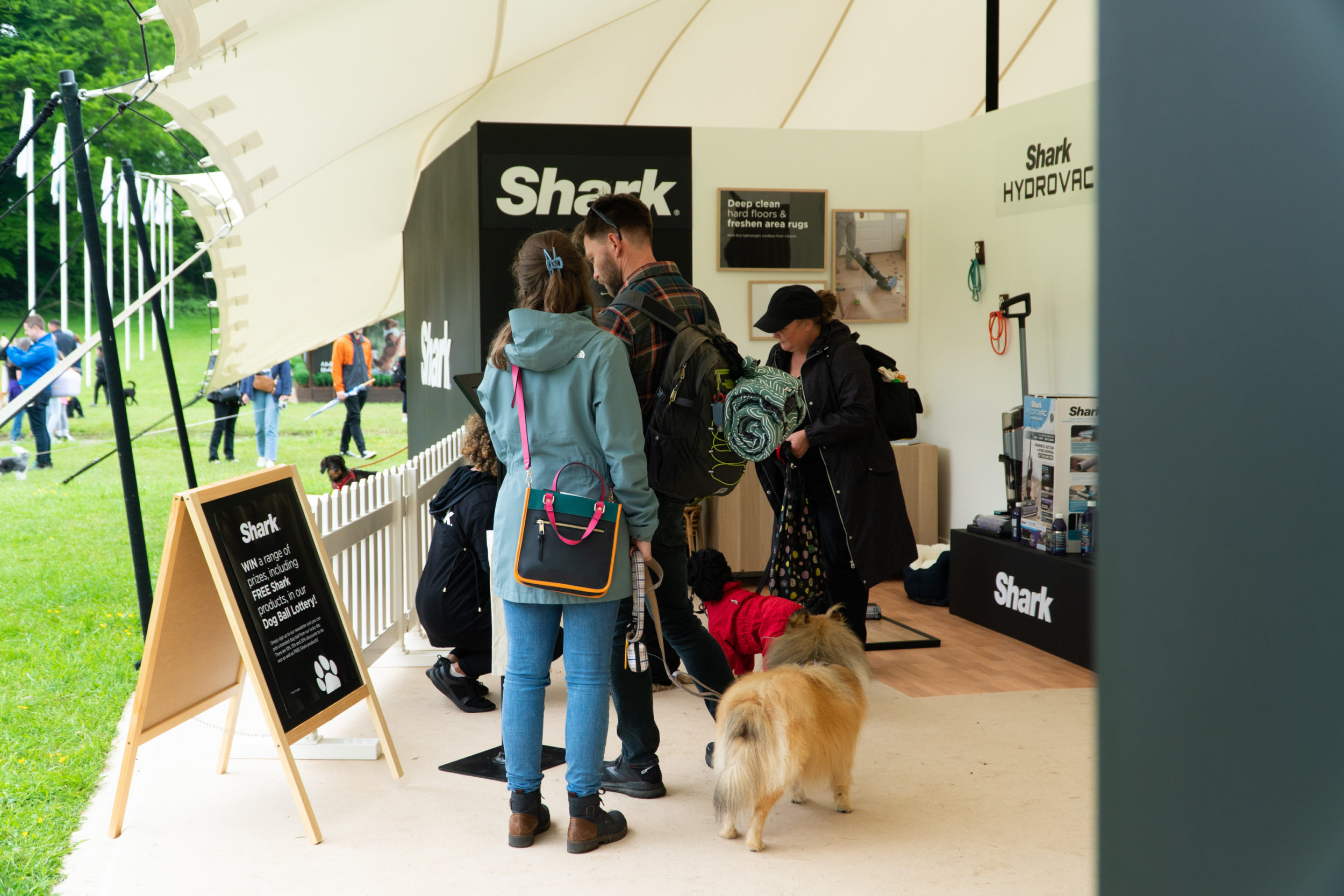 A group of people learning about Shark products