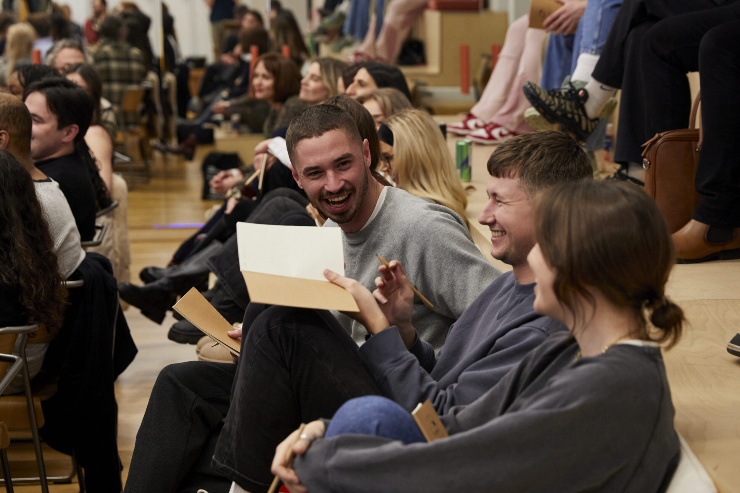 A group of people are laughing